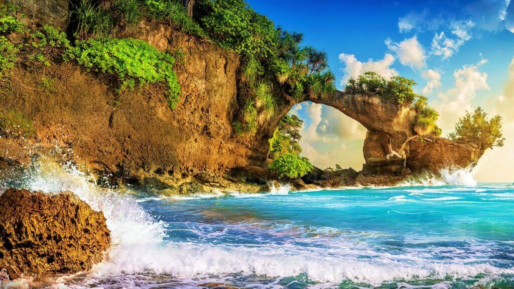 Discover the Arch Before the Sea Eats It